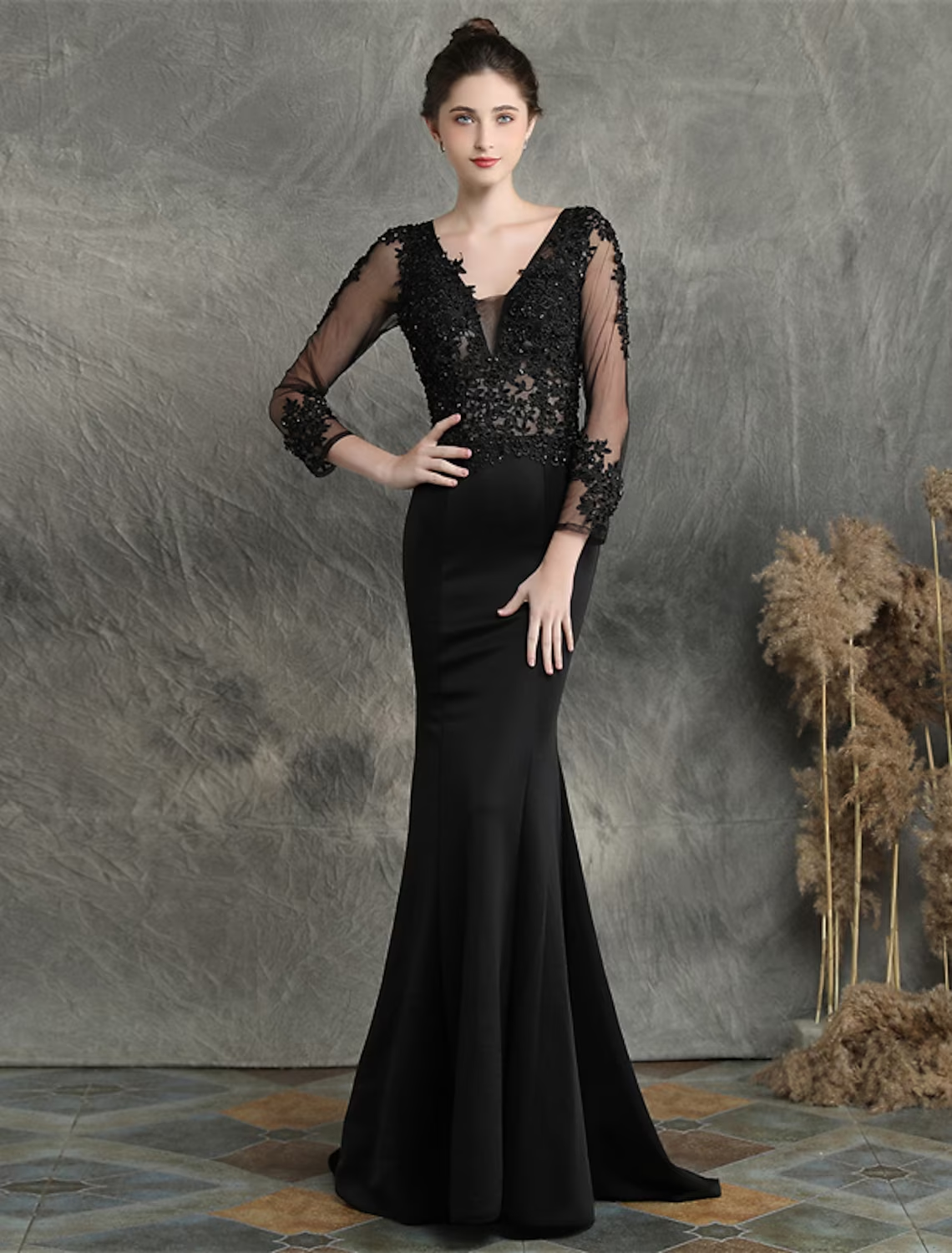 Side profile of the elegant long sleeve mermaid prom dress, emphasizing the silhouette and formal design.