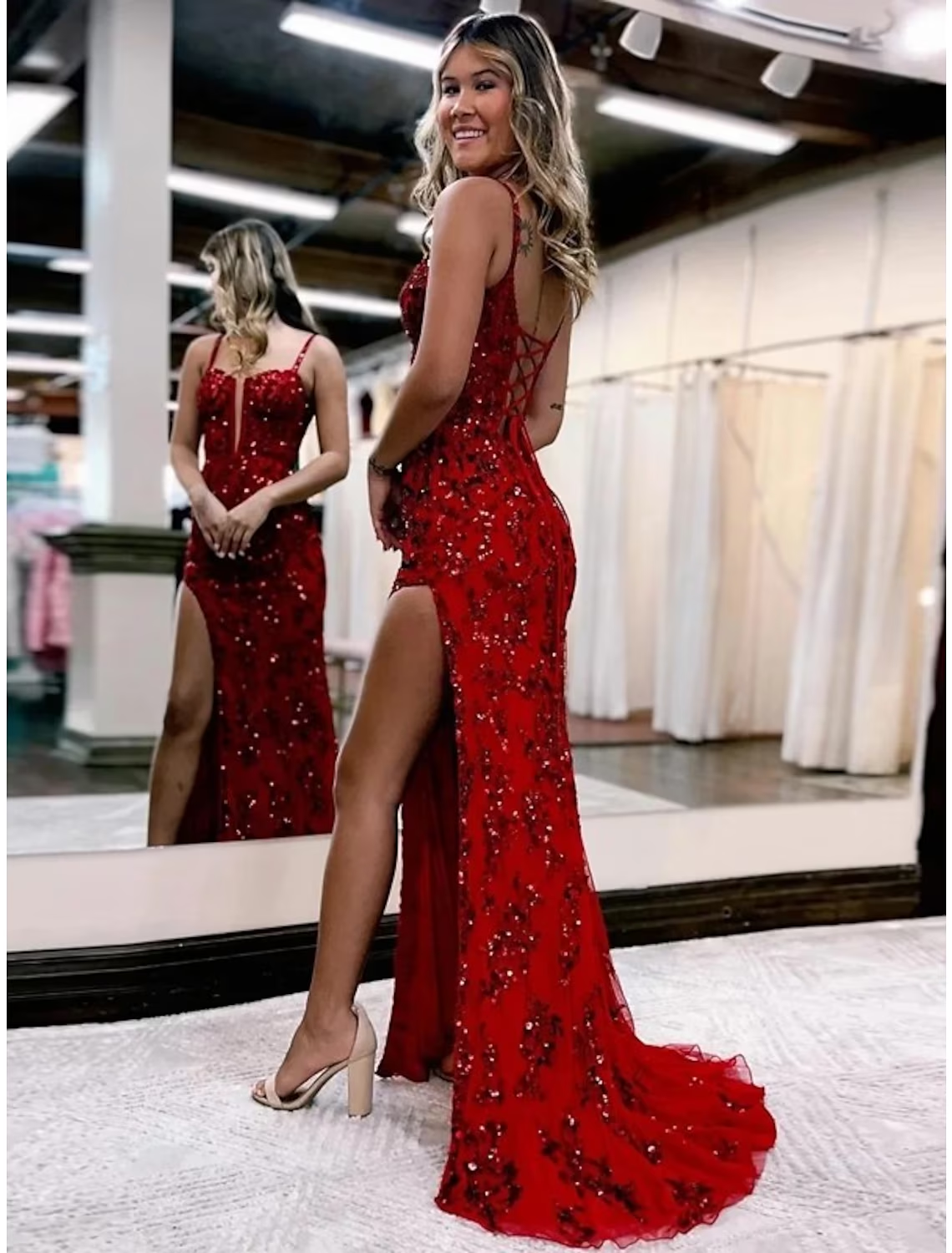Side view of the formal Tulle dress, highlighting the sweep train.
