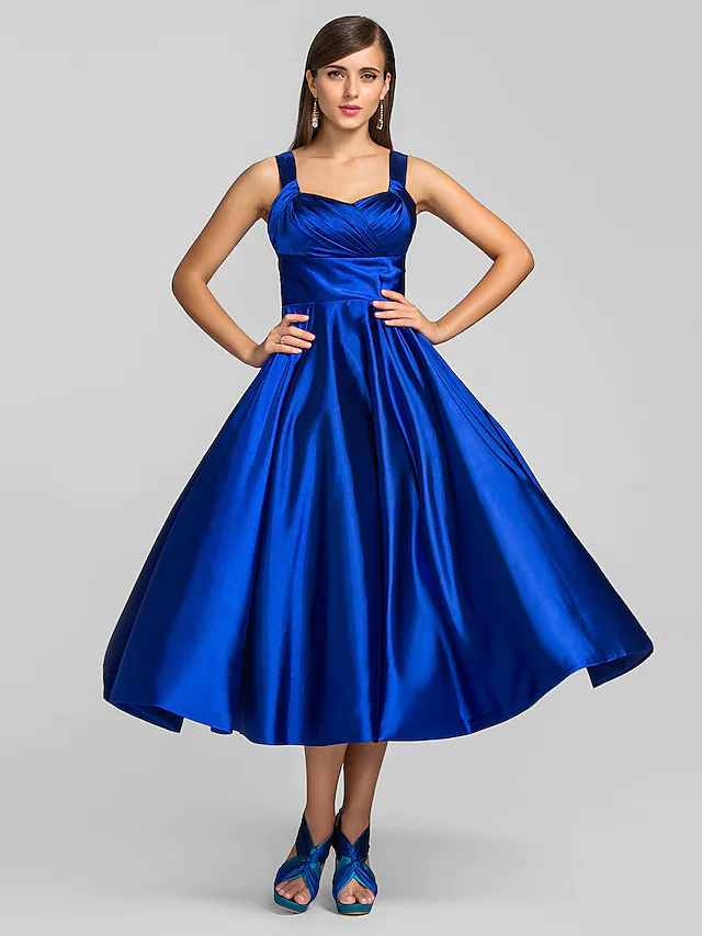 Elegant A-line tea length dress with square neck.