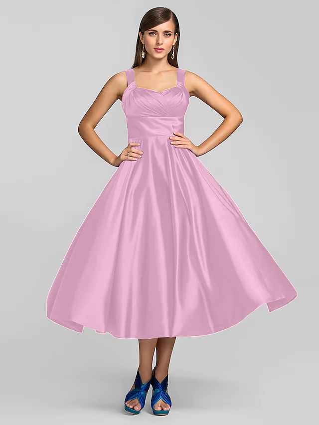 Front view of A-line cocktail dress in stretch satin.