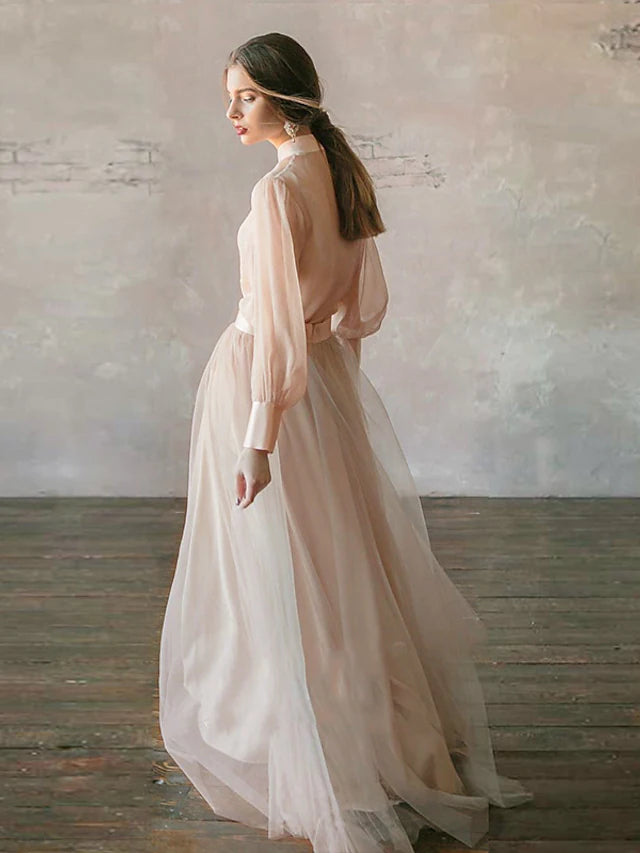 Close-up of the stand collar and long sleeves of the chiffon formal dress.