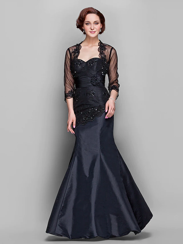 Elegant navy blue mermaid Mother of the Bride gown, front view.