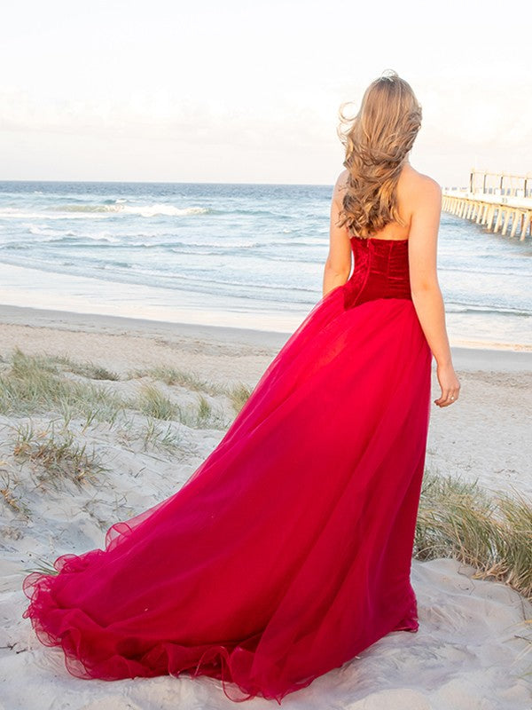Off-shoulder applique tulle ball gown prom dress.