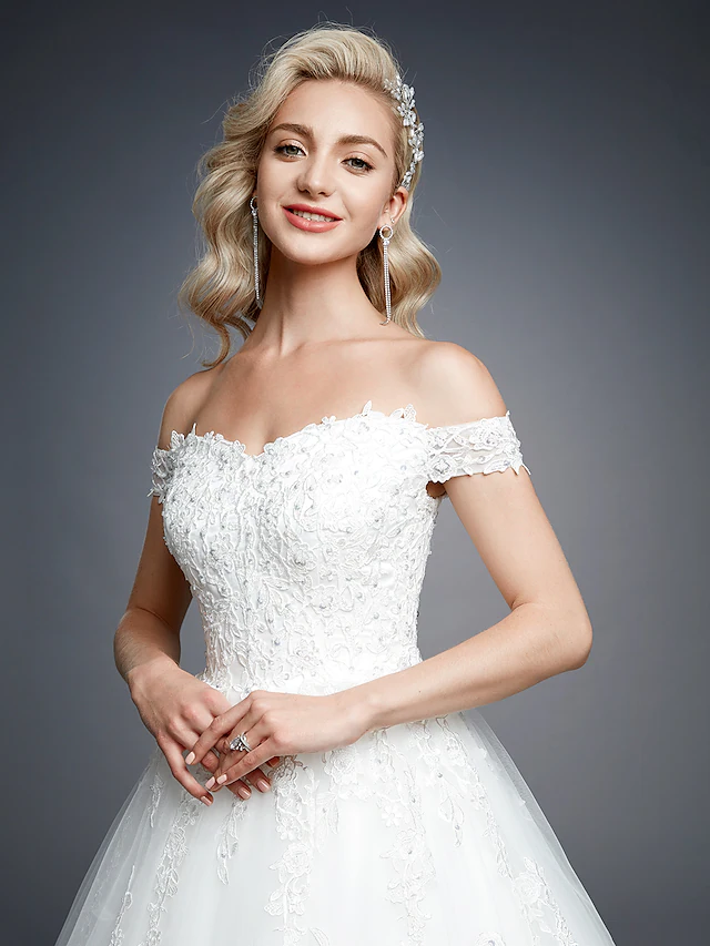 Romantic ball gown wedding dress with shimmering details.