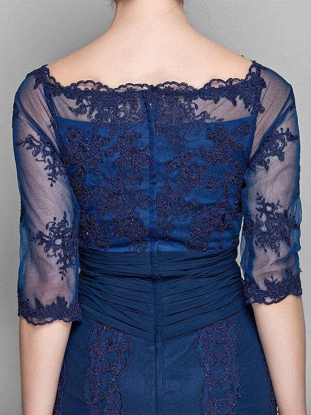 Full length view of the elegant off-shoulder Mother of the Bride gown.
