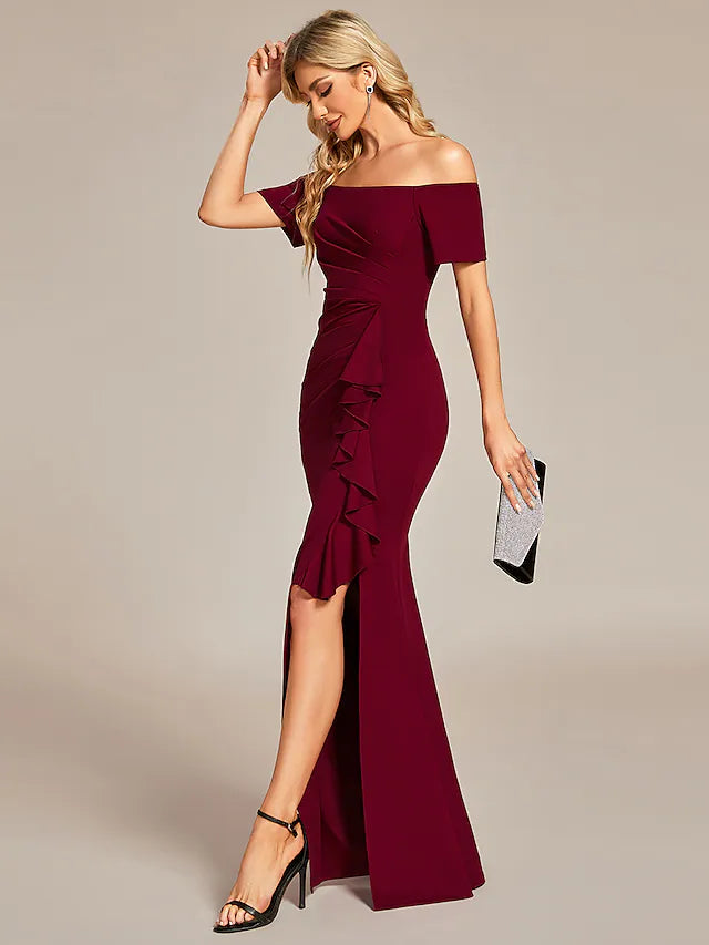 Model wearing a wine-colored off-shoulder ruched maxi dress.