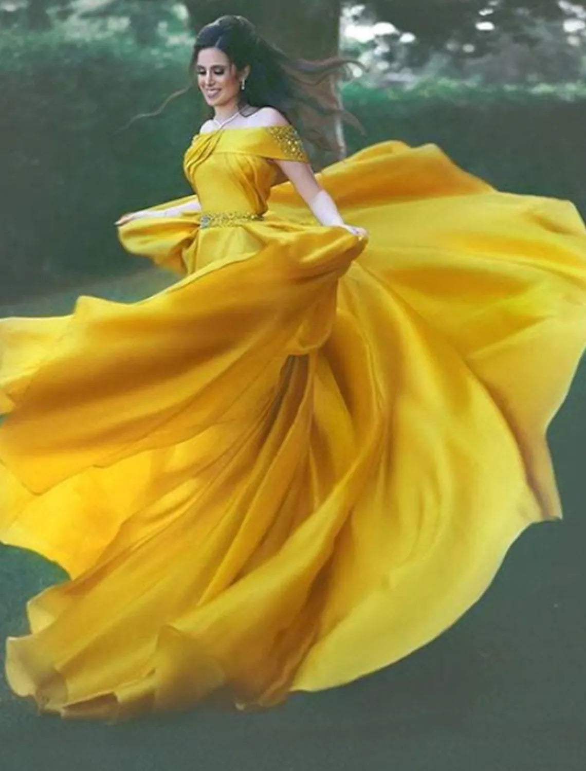 Elegant off-shoulder satin ball gown with short sleeves and pleats.