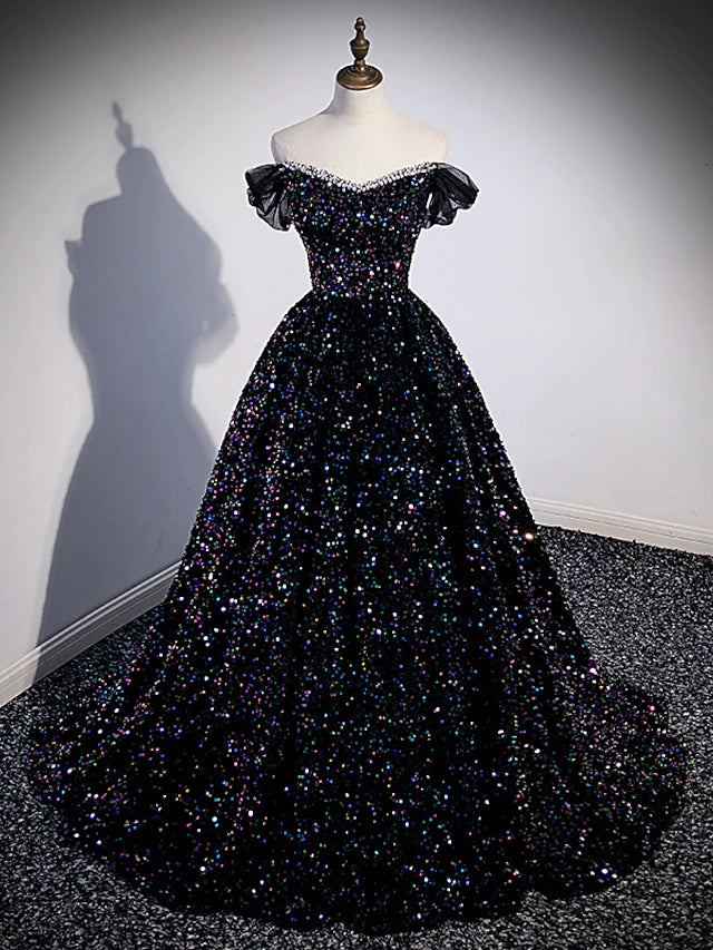 Model wearing an elegant off-shoulder sequined ball gown with a court train.