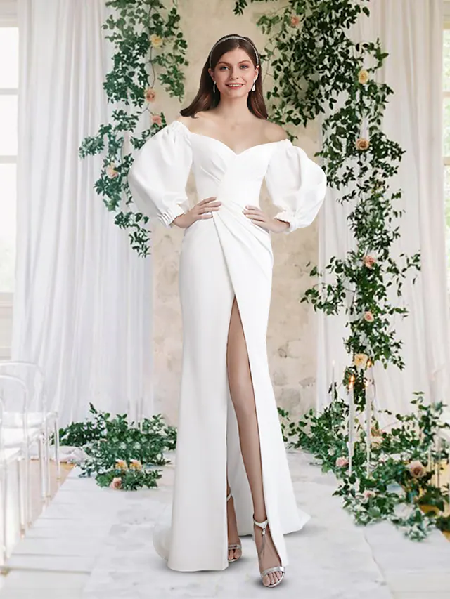White off-shoulder wedding dress with half sleeves and a stylish front split.