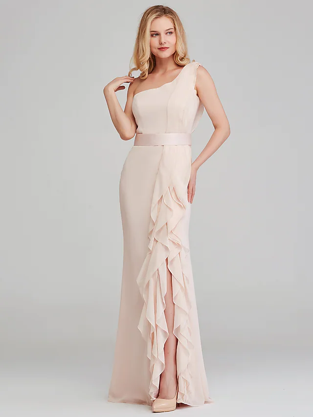 Model posing in a long one-shoulder formal dress.
