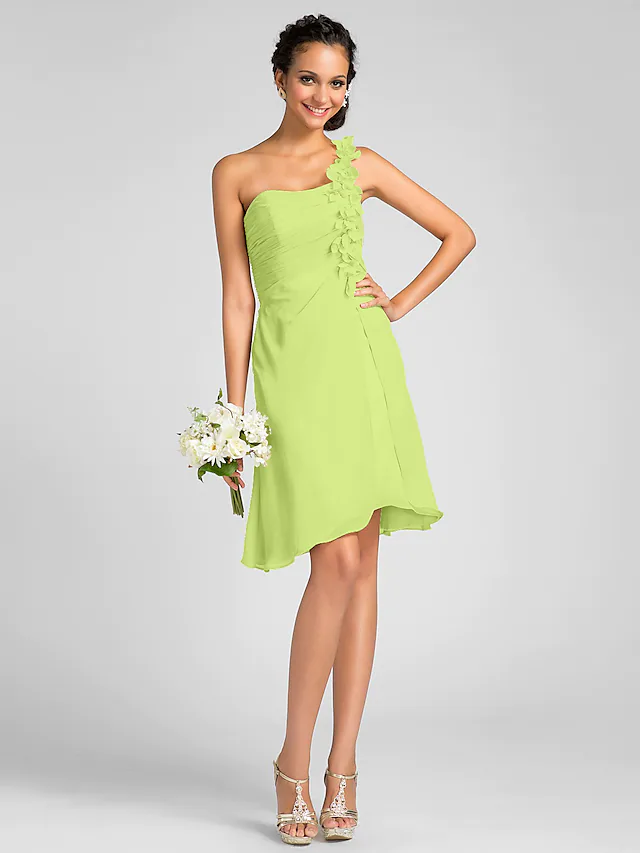 Back view of a one-shoulder chiffon bridesmaid dress, showcasing the flowing fabric.