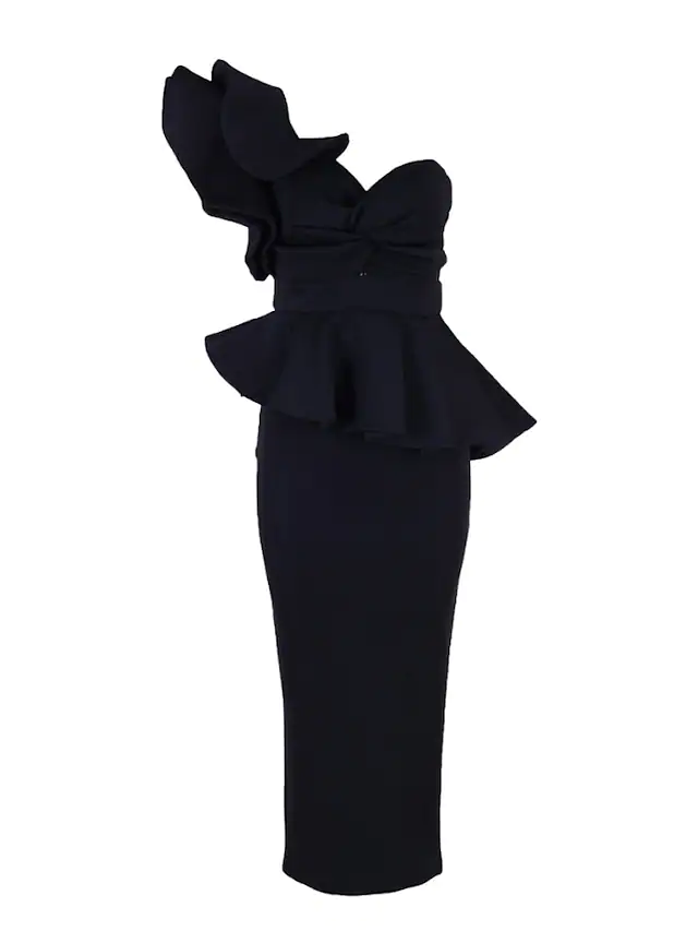 Close-up of the ruffled detail on a one-shoulder tea-length dress.