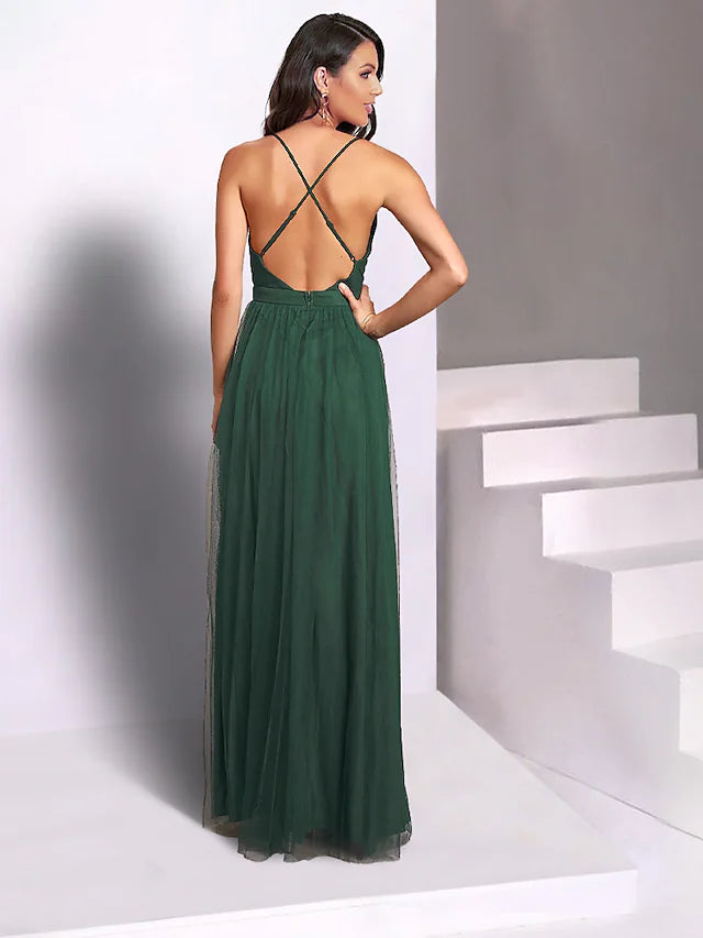 Close-up of the pleated tulle fabric and spaghetti straps on the elegant dress.