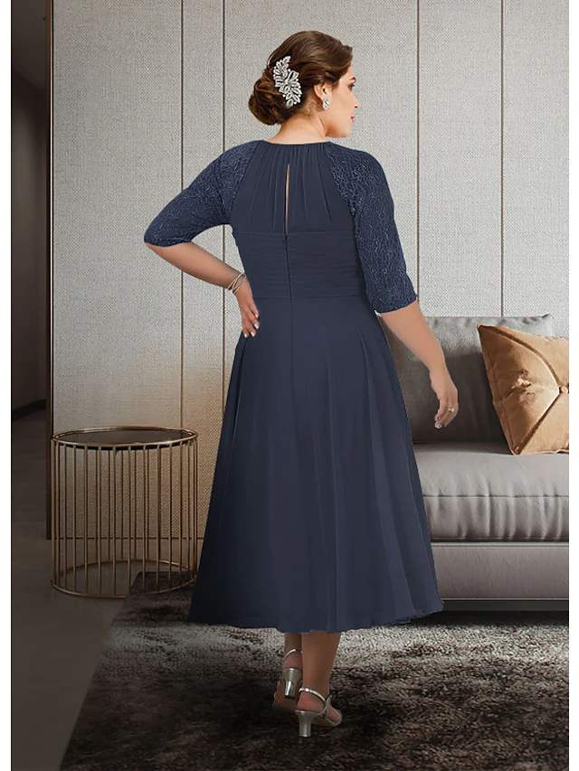 Side view of an elegant plus size A-line Mother of the Bride dress with chiffon lace details.