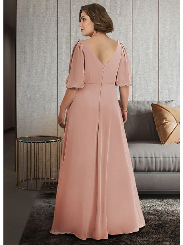 Plus size A-Line mother of the bride gown featuring a V-neckline and delicate chiffon fabric.
