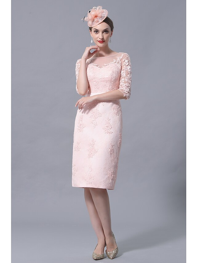 Another side profile of the elegant knee-length Mother of the Bride dress.