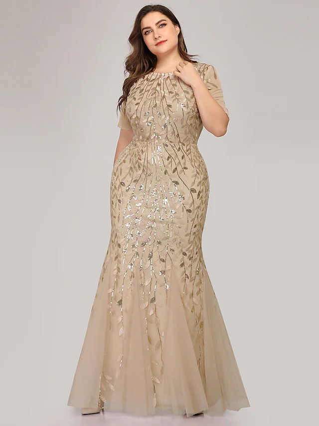 Side view of the elegant plus size evening gown, showcasing the floor-length tulle skirt.