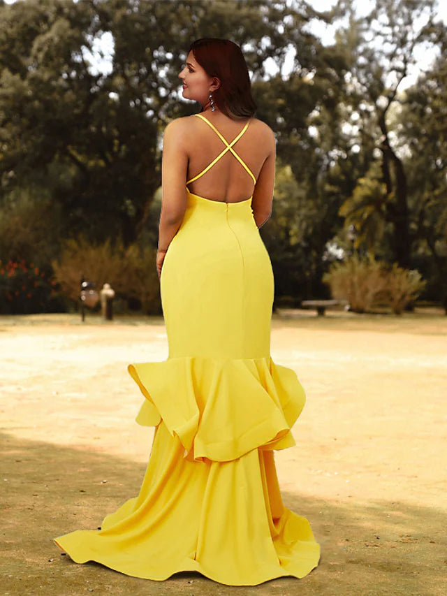 Back view of plus size tiered mermaid trumpet dress.
