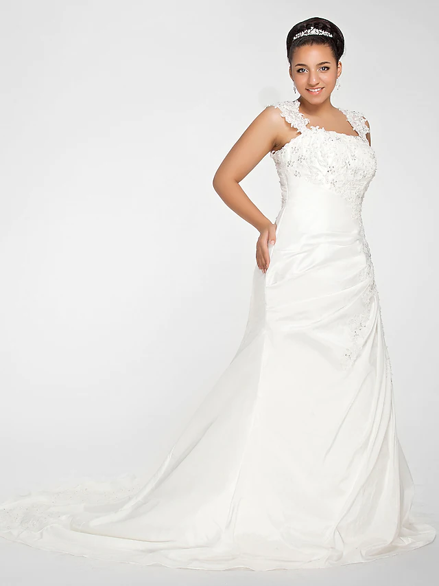 Back view of a plus size mermaid wedding dress showing the court train.