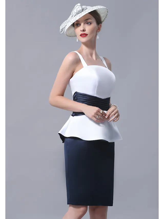 Detail of the straight neckline and sash on a satin formal dress.