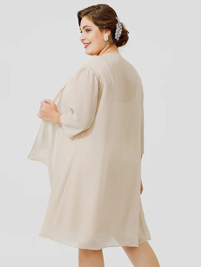 Side view of the knee-length chiffon and lace Mother of the Bride dress.