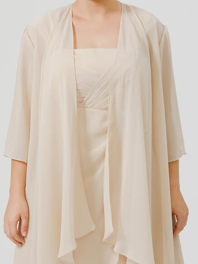 Fabric detail of the chiffon and lace plus size dress.