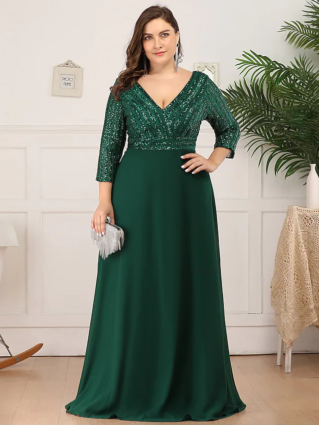 Close-up of the V-neckline and sequin details on the dress.