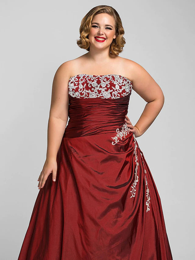 Back view of plus size strapless taffeta ball gown.
