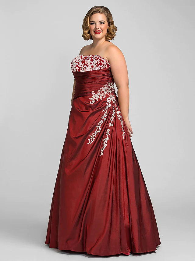 Side view of plus size strapless taffeta ball gown.