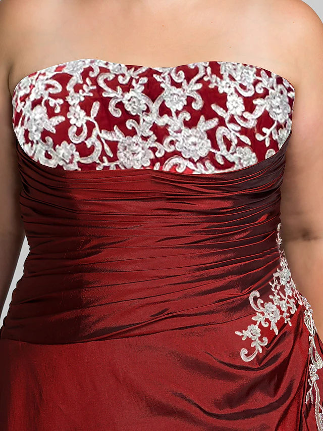 Close-up of beading appliques on taffeta ball gown.