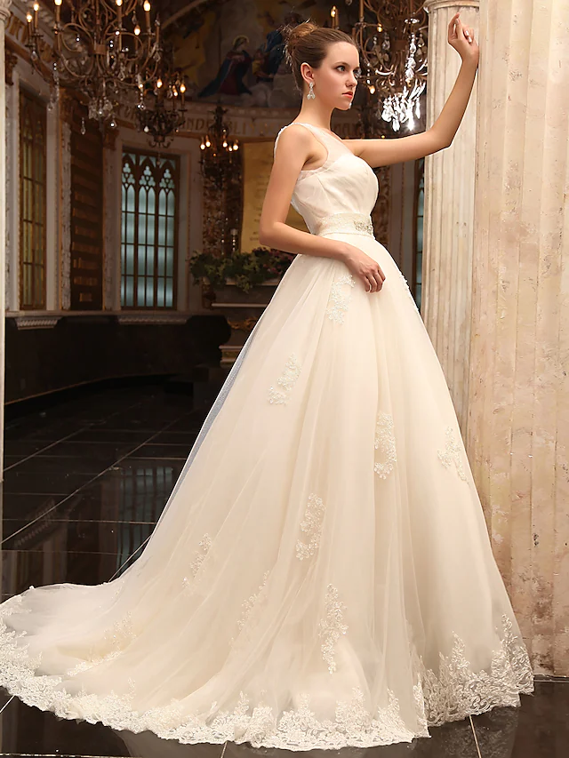 Side view of the A-Line wedding dress, showcasing the satin bodice and tulle skirt.