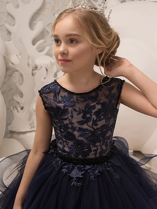 Floor length tulle flower girl dress, side view.