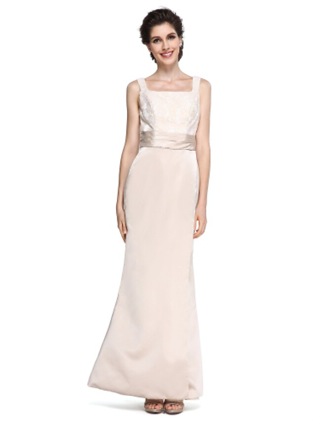 Close-up of square neckline and 3/4 sleeve on satin dress.