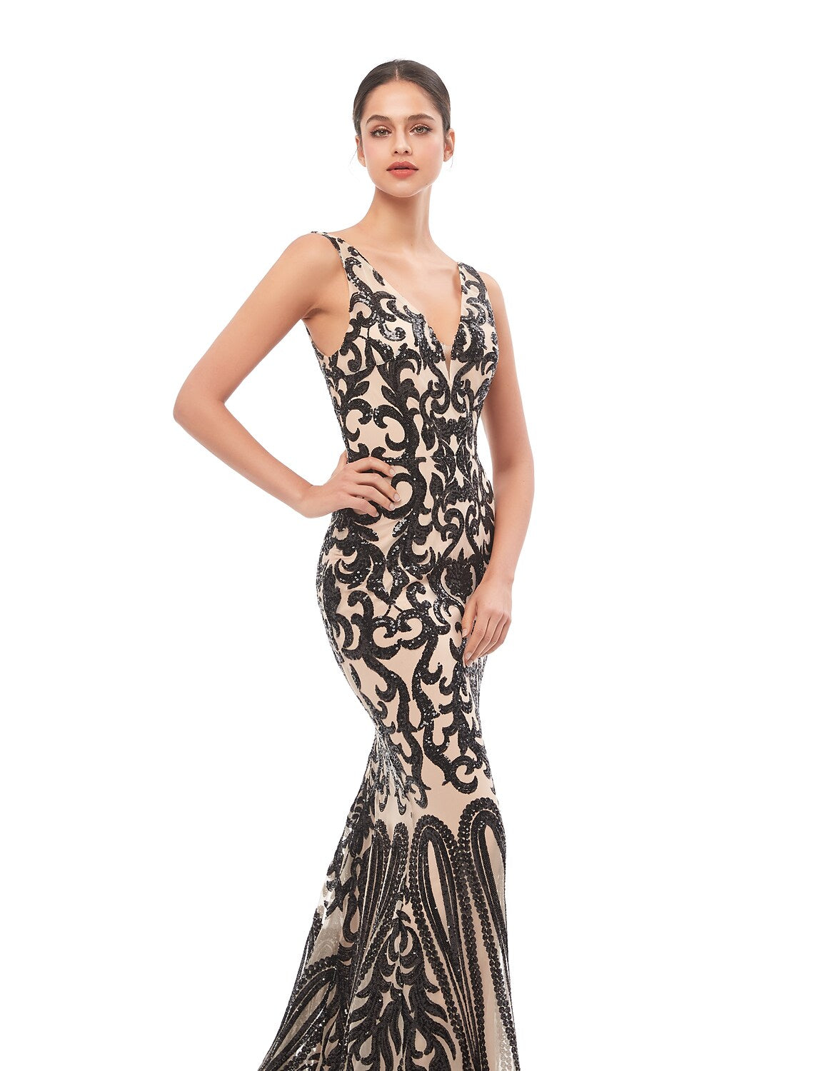 Side profile of the sequin tulle trumpet dress.
