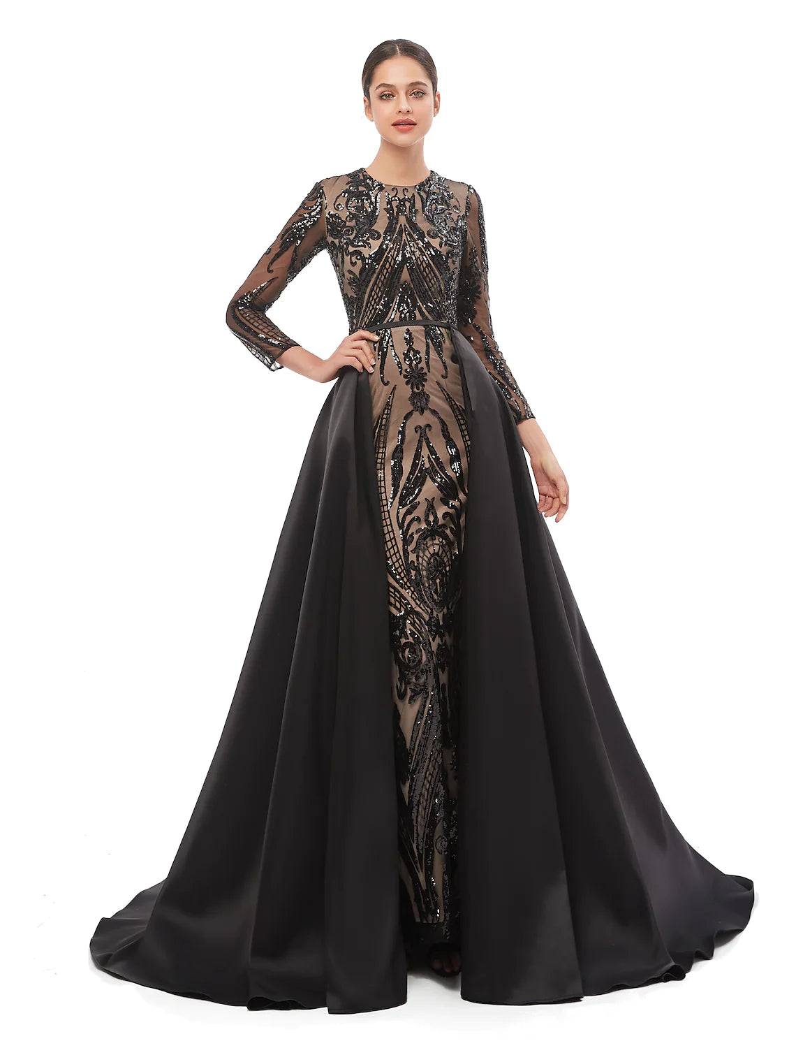 Woman wearing a navy blue sequined mermaid trumpet dress.