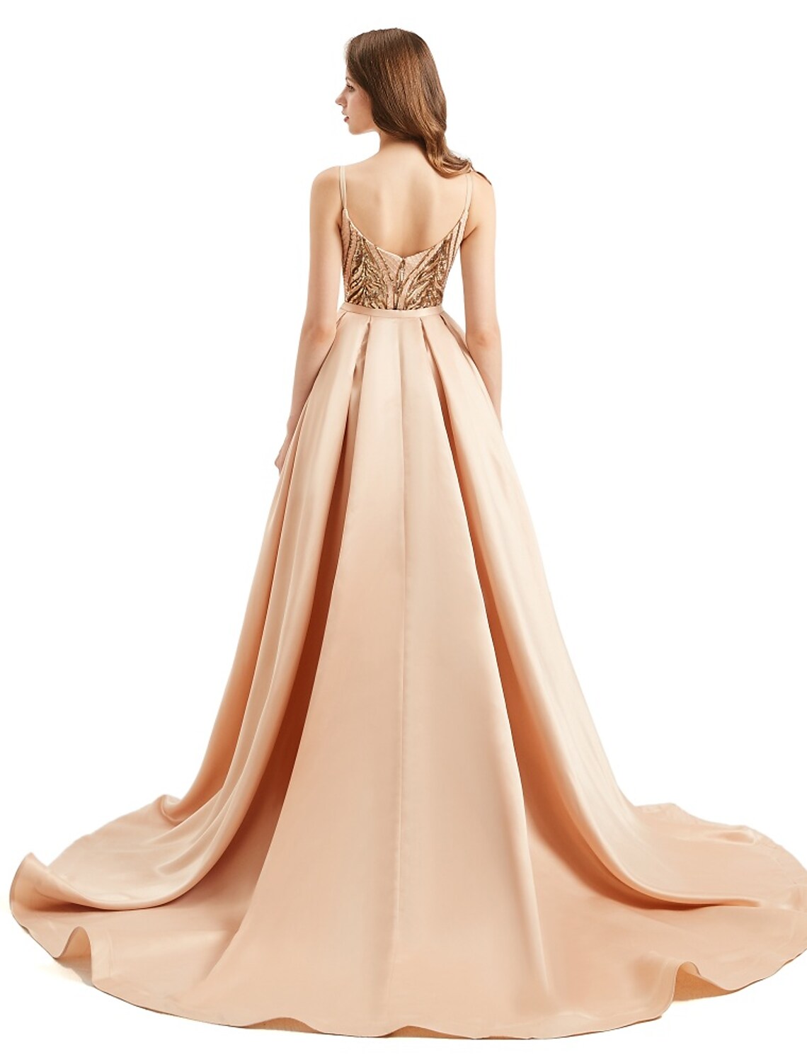 Close-up of the sequined fabric and V-neckline on the evening gown.