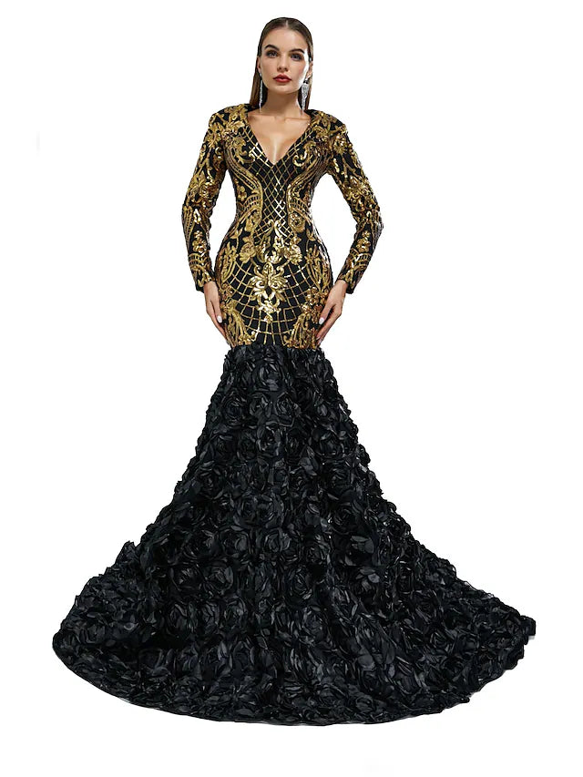 Woman in an elegant sequined mermaid trumpet gown with long sleeves and V-neck.