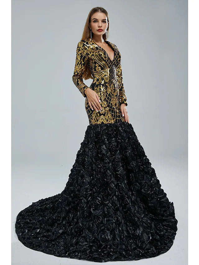 Woman posing gracefully in a shimmering long sleeve V-neck evening gown.