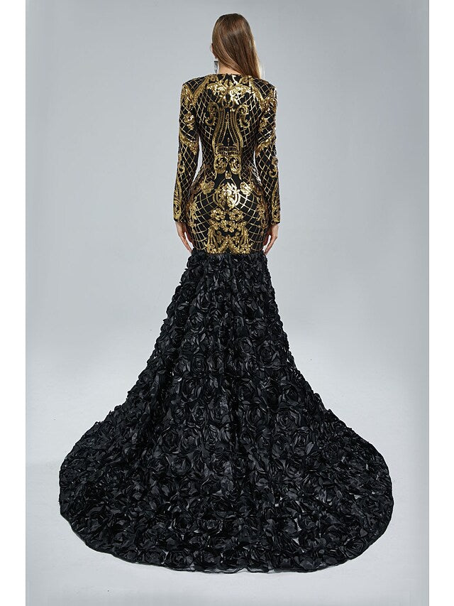 Full length view of a woman in a glamorous sequined mermaid gown.