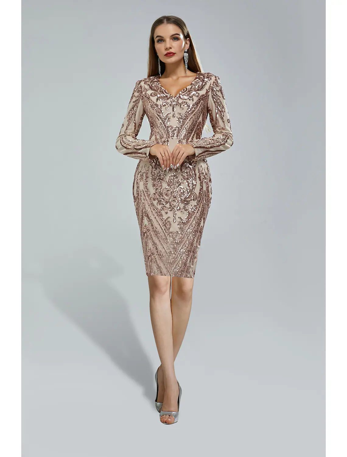 Elegant sequined mermaid cocktail dress with V-neck and long sleeves.