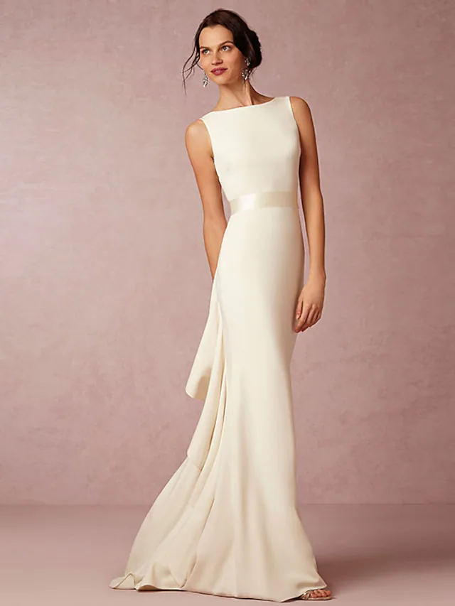 Elegant white satin wedding dress with bateau neck and regular straps, front view.