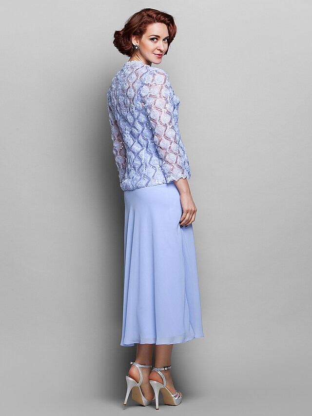 Front view of the sheath column dress, highlighting the wrap and straps.