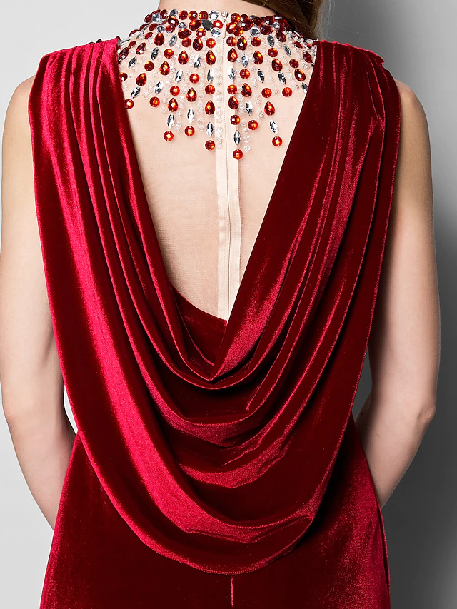 Detail of the crystal embellishments on the dark velvet Mother of the Bride dress.