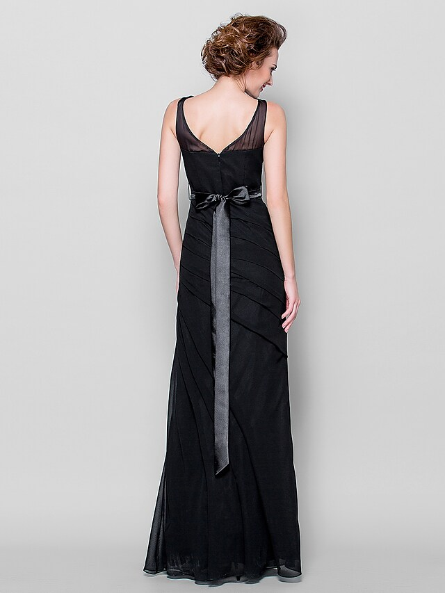 Back view of georgette gown with sash and beading appliques.