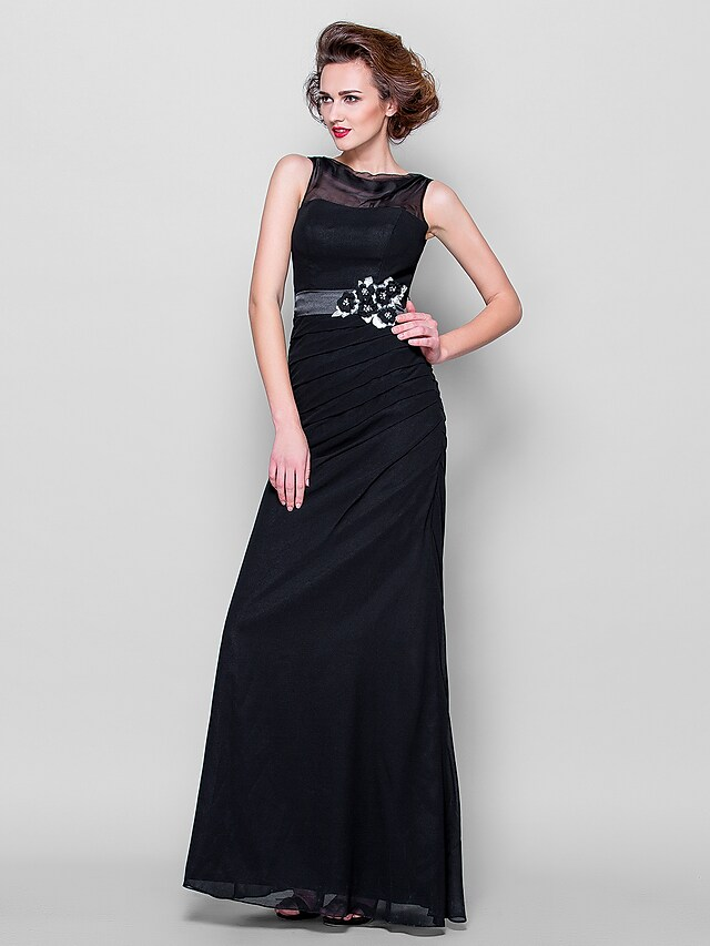 Close-up of cowl neck and beading details on formal dress.