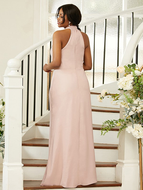 Back view of a plus size ruched halter neck floor-length satin-like bridesmaid dress.