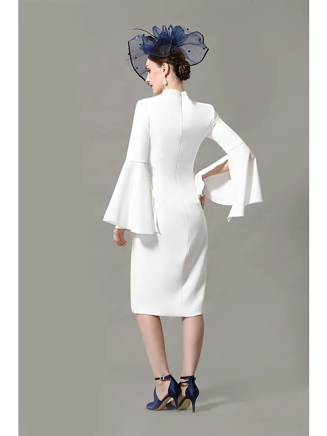 Side view of the knee-length mother of the bride dress.