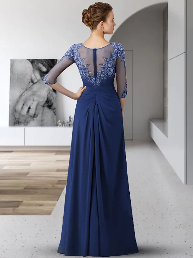Back view of the elegant Mother of the Bride dress, showcasing flowing chiffon and lace details.