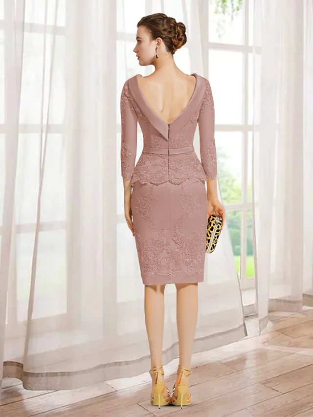 Elegant Mother of the Bride dress, side view, showcasing lace details.