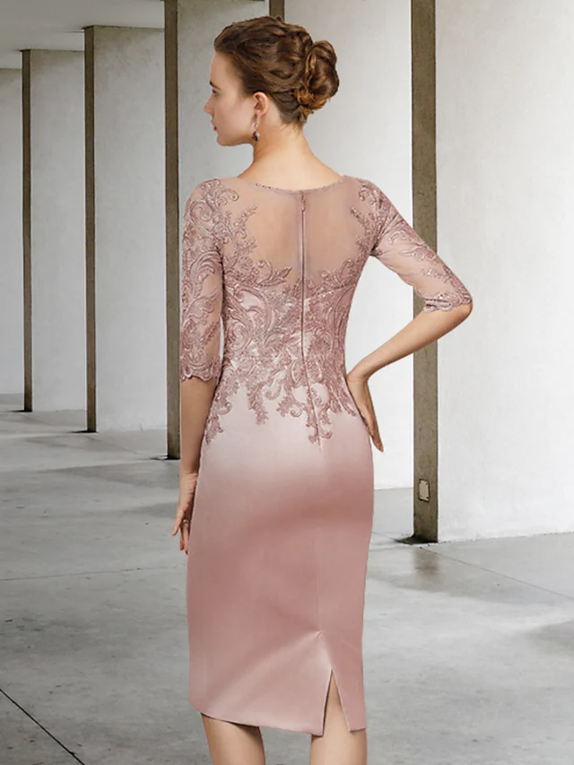 Side view of the elegant light blue two-piece Mother of the Bride dress, highlighting its sheath silhouette.